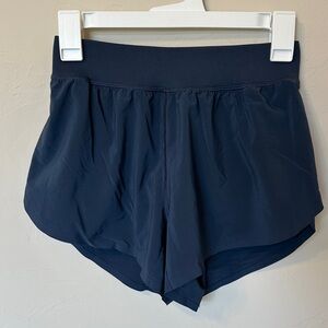 CRZ YOGA High waisted dolphin athletic running shorts 3”